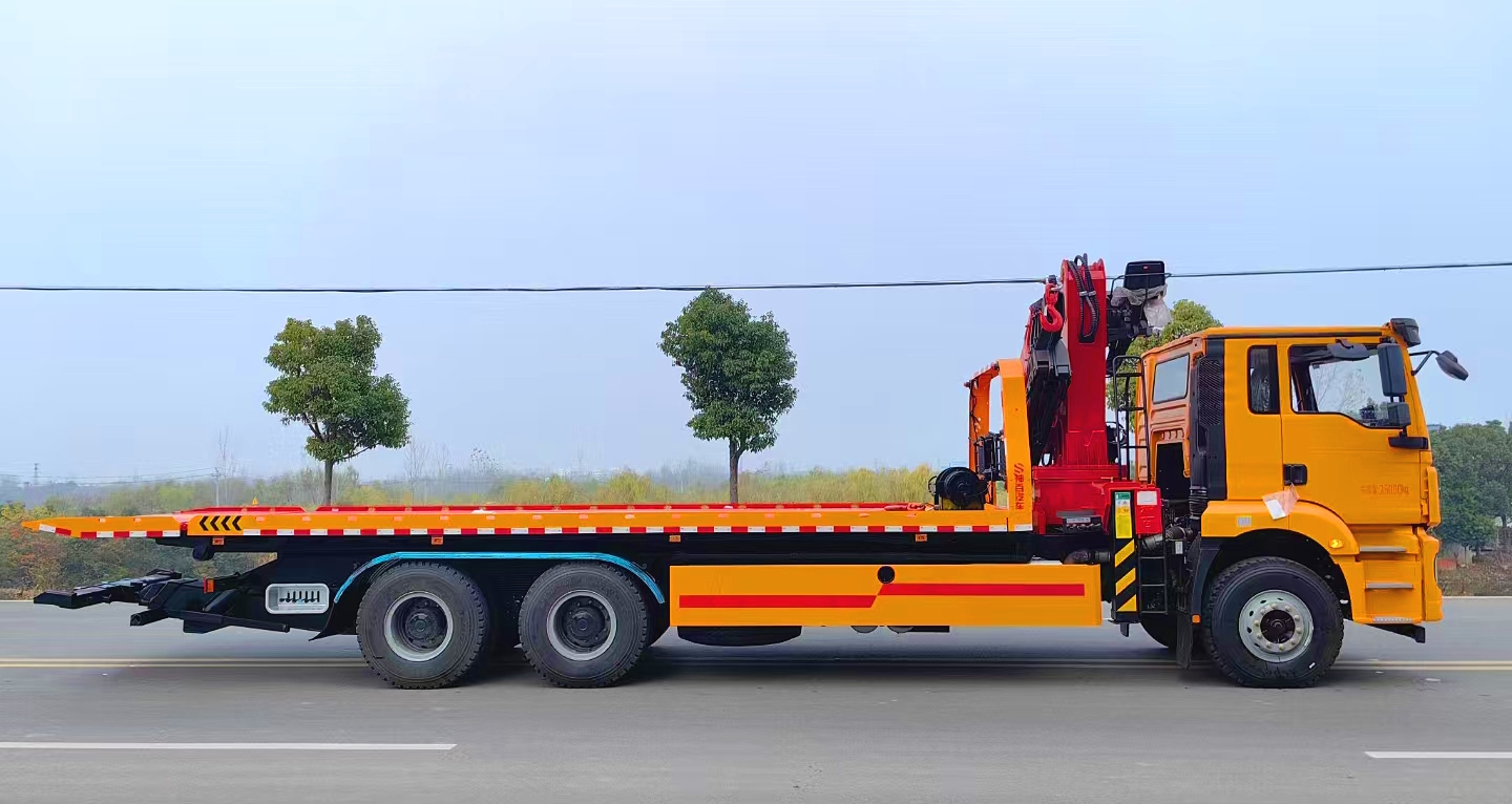 Tow truck with crane